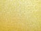 Focused yellow texture glitter background