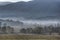 Fog covers the fields of Cades Cove