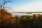 Fog covers the rolling hills below. View from atop Morrow Mountain state park.