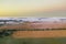 Fog on fields, wind turbines in the background