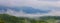 Fog flow through Khaoyai National Park mountain valley in the morning light during rainy season, Thailand