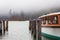 Fog on lake Kenigsee, Germany. Mist on lakeshore. German landscape. Autumn scenery in Europe, national Berchtesgaden park.