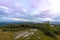 Fog lifts off the Kittatinny Mountains under a stormy sunset at High Point State Park, the top of NJ