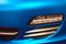 Fog light of german exclusive sport car with blue matte car wrap
