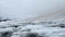 Fog in the mountains. Aerial view of a beautiful mountain winter landscape.