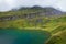 Fog over the green hills around Bachalpsee