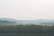 Fog over a reservoir in a natural forest, Thailand