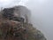 Fog rolling over cliff edge