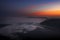 Fog in the valley during sunrise. Photo taken from mount Rigi