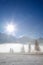 Foggy alpine meadow in morning sunshine