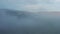 Foggy birds eye panorama of highlands in Iceland. Aerial view cloudy and misty northern icelandic countryside. Amazing