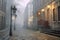 foggy cobblestone street with vintage lampposts