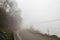 Foggy Country Road. Fog creates a feel of emptiness as it leads to seemingly nowhere. Ilisu, Gakh, Azerbaijan