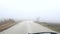 foggy day, driving on a rural road