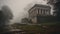 a foggy day with a stone structure in the foreground and trees on the far side of the picture, and a few steps leading up to it