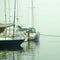foggy dock. pier, autumn silence. calm. the yacht is on the water