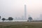 Foggy haze view of Maidan park in Kolkata Calcutta at early morning in the winter