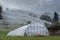 Foggy hill foggy hill with vegetable greenhouse in switzerland in Wabern