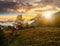 Foggy and hot sunset in Carpathian mountains