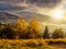 Foggy and hot sunset in Carpathian mountains at sunset