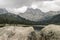 A foggy landscape, a view of the cliffs, the forest and lake, Ergaki mountains