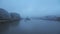 Foggy and misty River Thames in London on Coronavirus Covid-19 lockdown day one, in atmospheric weat