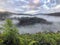 Foggy morning among green hills in summer. Picturesque natural landscape