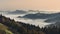 Foggy mountain landscape at dawn. Autumn scenery. Slovenia