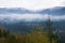 Foggy mountain range in yoho national park, Canada in fall foliage