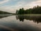 Foggy and mystical lake landscape