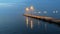 foggy Night sea harbor street lantern  light blue sea water reflection pier