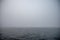 Foggy ocean view with limited visibility