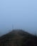 Foggy outdoor scene with hills and trails