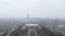 Foggy rainy landscape in Paris skyline with little visibility