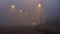 foggy road traffic lights cars moving in the morning in ioannina greece