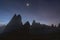 Foggy rocks at early morning in Capadocia with moon and star