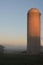 Foggy Silo Sunrise