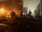 foggy summer night in russian suburban condo street