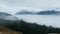 Foggy valleys and the Swiss Alpine peaks near Lucerne, Switzerland