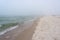 Foggy weather by the sea. Baltic beach