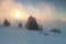 Foggy winter sunrise on mountain Feldberg