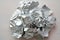 Foil. Metal crumpled background. Gray or silver background