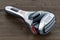 Foil-type cordless razor, shaver on the wooden table, 3D rendering