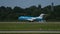 Fokker 70 of KLM airlines landing at Dusseldorf airport