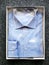 Folded Blue Button Down Shirt in Open Box