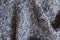 Folded blue grey melange woolen fabric