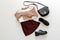 Folded clothes for women fashion urban basic outfit. Female spring look autumn outfit burgundy skirt beige sweater black shoes bag