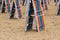 Folded deck chairs at sandy beach at seaside