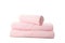 Folded fresh pink towels isolated on background