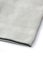 Folded grey napkin on white background